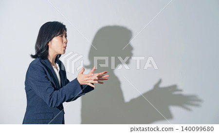 A female business person making a point A female business person making a point 140099680