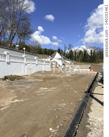 Renovation of the sea embankment. A coastal property undergoing renovation or construction. Construction materials Renovation of the sea embankment. A coastal property undergoing renovation or construction. Construction materials 140101461