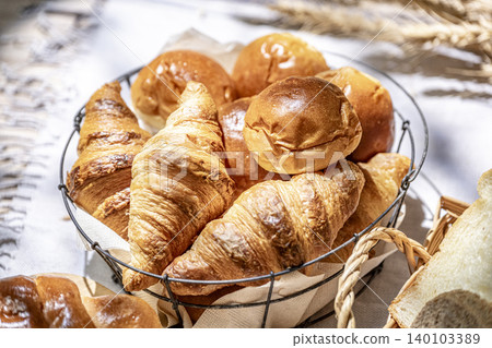 Lots of delicious-looking bread lined up Lots of delicious-looking bread lined up 140103389
