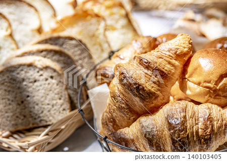 Lots of delicious-looking bread lined up Lots of delicious-looking bread lined up 140103405