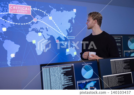 Cybersecurity analyst monitoring critical events on global network map in SOC 140103437