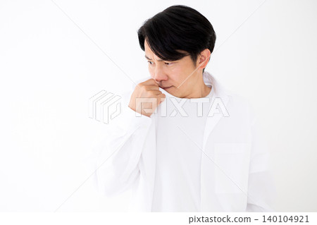 Middle-aged man concerned about body odor Middle-aged man concerned about body odor 140104921
