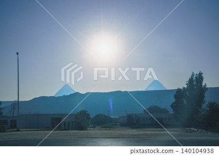 Sunrise View of the Pyramids of Giza in Cairo Egypt Sunrise View of the Pyramids of Giza in Cairo Egypt 140104938