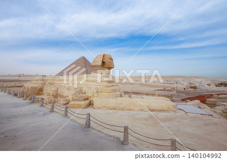 The Great Sphinx of Giza and Pyramid in Cairo, Egypt The Great Sphinx of Giza and Pyramid in Cairo, Egypt 140104992