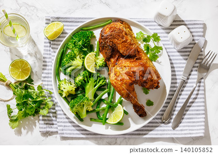 Keto Baked Chicken Half With Green Vegetables Side Keto Baked Chicken Half With Green Vegetables Side 140105852