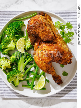 Keto Baked Chicken Half With Green Vegetables Side Keto Baked Chicken Half With Green Vegetables Side 140105853