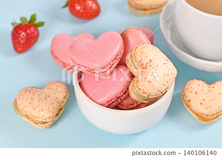 Bowl with heart shaped French macaron sweets 140106140