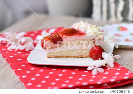 Slice of layered strawberry fruit cream cake Slice of layered strawberry fruit cream cake 140106146