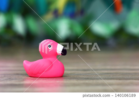 Single pink rubber duck flamingo bird with copy space 140106189