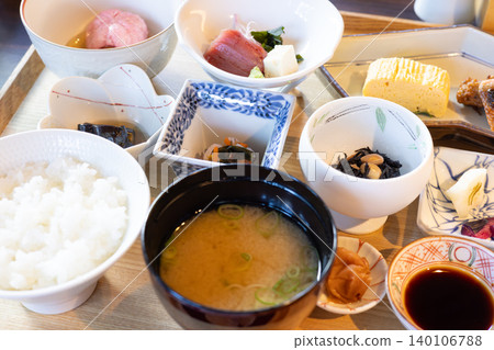 A delicious Japanese breakfast with plenty of side dishes A delicious Japanese breakfast with plenty of side dishes 140106788