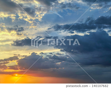 Dramatic Sunset Sky With Dark Storm Clouds Dramatic Sunset Sky With Dark Storm Clouds 140107682