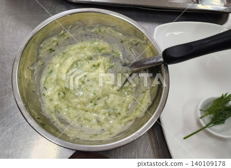 Homemade Creamy Dill Sauce or Tartare Dressing in a Stainless Steel Mixing Bowl Homemade Creamy Dill Sauce or Tartare Dressing in a Stainless Steel Mixing Bowl 140109178