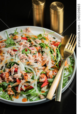 Fresh Tuna Salad with Onions and Cherry Tomatoes. Italian Mediterranean Cuisine Fresh Tuna Salad with Onions and Cherry Tomatoes. Italian Mediterranean Cuisine 140109603