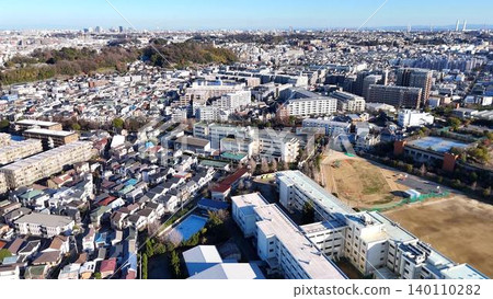 A school with a large schoolyard and a beautiful residential area in Kohoku Ward, Yokohama City. A school with a large schoolyard and a beautiful residential area in Kohoku Ward, Yokohama City. 140110282