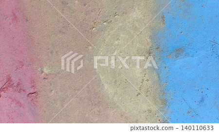 Abstract pastel chalk powder background on concrete pavement with soft pink, yellow, and blue color transitions, creating a vibrant artistic texture. High quality photo 140110633