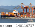 Cargo ship at container port loading global trade goods 140110737