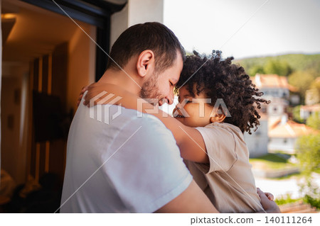 Father and son embracing with love and affection Father and son embracing with love and affection 140111264