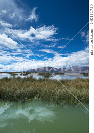 Totora boat on the Titicaca lake near Puno, Peru Totora boat on the Titicaca lake near Puno, Peru 140111739