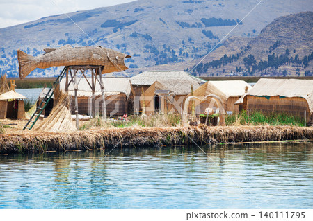 Totora boat on the Titicaca lake near Puno, Peru Totora boat on the Titicaca lake near Puno, Peru 140111795