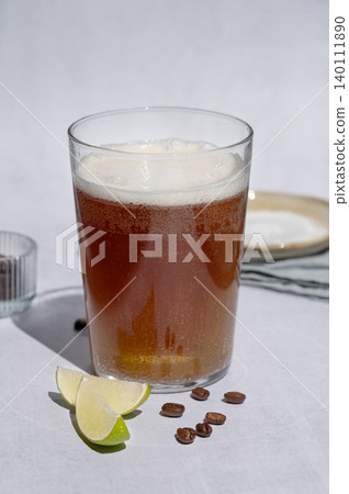 Coffee bomb with sparkling water and espresso shot, trendy summer coffee drink Coffee bomb with sparkling water and espresso shot, trendy summer coffee drink 140111890