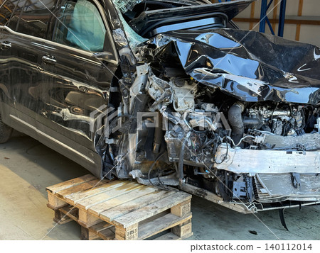 Damaged Mercedes vehicle after severe road collision 140112014