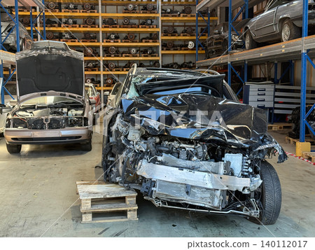 Damaged Mercedes vehicle after severe road collision Damaged Mercedes vehicle after severe road collision 140112017