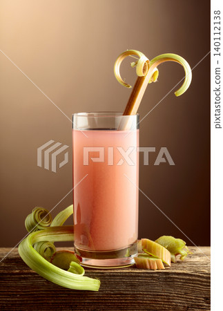 Refreshing glass of organic rhubarb drink. Refreshing glass of organic rhubarb drink. 140112138