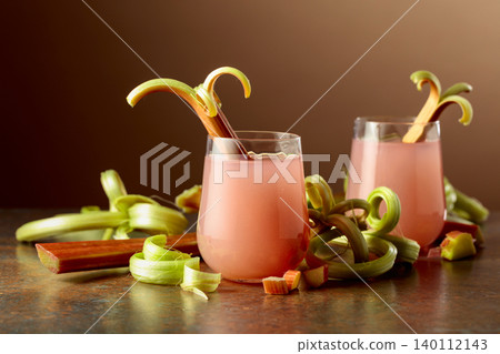 Refreshing glass of organic rhubarb drink. Refreshing glass of organic rhubarb drink. 140112143