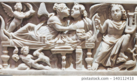 Ancient Marble Childs Sarcophagus. Roman Sarcophagus Or Coffin For Young Girl From Wealthy Family. Marble Carved With Scenes Of Wedding Of Greek Deities Cupid And Psyche. This Sarcophagus Was Not Ancient Marble Childs Sarcophagus. Roman Sarcophagus Or Coffin For Young Girl From Wealthy Family. Marble Carved With Scenes Of Wedding Of Greek Deities Cupid And Psyche. This Sarcophagus Was Not 140112418