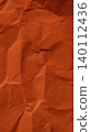 Orange crumpled paper texture abstract vertical background 140112436