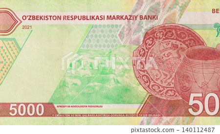 Official monetary Uzbekistan bill of 5000 som cash authorized for public circulation by Ozbekiston Respublikasi front view Official monetary Uzbekistan bill of 5000 som cash authorized for public circulation by Ozbekiston Respublikasi front view 140112487