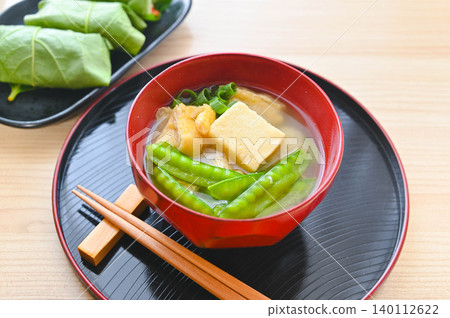 Miso soup with snow peas and freeze-dried tofu Miso soup with snow peas and freeze-dried tofu 140112622