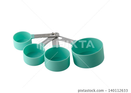 Modern kitchen measuring cups in sage green, complete nesting set isolated on white background Modern kitchen measuring cups in sage green, complete nesting set isolated on white background 140112633