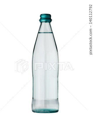 Clear glass bottle of mineral water 0.5 liter isolated on white background Clear glass bottle of mineral water 0.5 liter isolated on white background 140112792