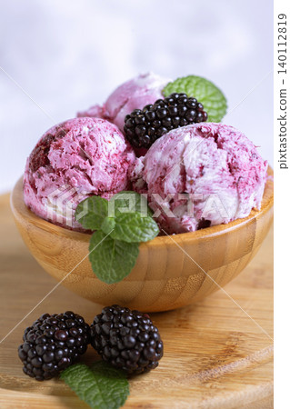 Delicious cream and blackberry ice cream. Delicious cream and blackberry ice cream. 140112819