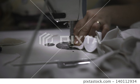 Sewing Machine Action. Presser Foot And Needle Collaborate To Produce Uniform Seams Efficiently. Media Sewing Machine Action. Presser Foot And Needle Collaborate To Produce Uniform Seams Efficiently. Media 140112934
