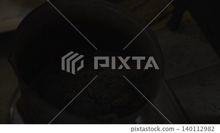 Meticulous Examination Of Luminous Particulates And Stored Heat Enclosed In Durable Metal Enclosure. Media Meticulous Examination Of Luminous Particulates And Stored Heat Enclosed In Durable Metal Enclosure. Media 140112982