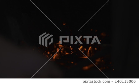 Nightly Fire Sparks Dance Vividly. Dark Fireplace Sparks Twinkle And Sway Creating Warm Cinematic Scenes. Media Nightly Fire Sparks Dance Vividly. Dark Fireplace Sparks Twinkle And Sway Creating Warm Cinematic Scenes. Media 140113006