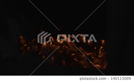 Warm Glowing Embers. Intimate Fire In Darkness. Flickering Red Coals Glowing Softly Inside. Media Warm Glowing Embers. Intimate Fire In Darkness. Flickering Red Coals Glowing Softly Inside. Media 140113009