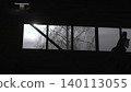 Worker Pauses Amid Moody Dim Lighting. Backlit Scene Featuring Silent Worker In Urban Environment . Media 140113055