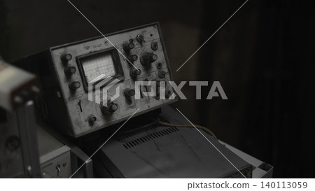 Closeup Of Vintage Instrument Controls. Workshop Scene Showing Dusty Knobs And Dials With Worn Labels . Media Closeup Of Vintage Instrument Controls. Workshop Scene Showing Dusty Knobs And Dials With Worn Labels . Media 140113059