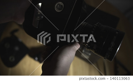 Skilled Technician Meticulously Calibrates Focus And Aperture Under Controlled Studio Lighting Conditions . Media Skilled Technician Meticulously Calibrates Focus And Aperture Under Controlled Studio Lighting Conditions . Media 140113063