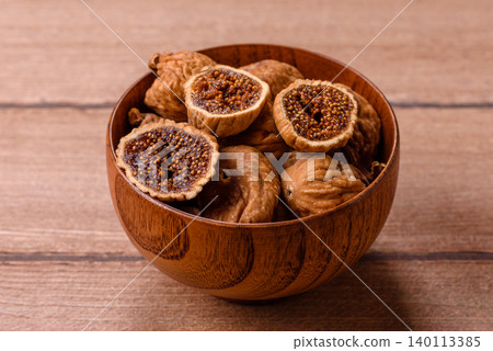 Dried whole fig as an ingredient for sweet desserts. Dried figs 140113385