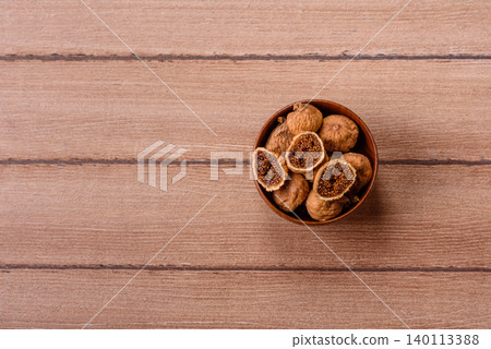 Dried whole fig as an ingredient for sweet desserts. Dried figs Dried whole fig as an ingredient for sweet desserts. Dried figs 140113388