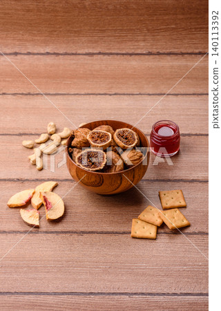 Dried whole fig as an ingredient for sweet desserts. Dried figs Dried whole fig as an ingredient for sweet desserts. Dried figs 140113392