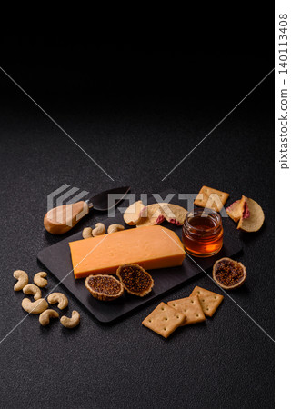Hard yellow cheddar cheese for sandwiches or pasta. Cheddar cheese Hard yellow cheddar cheese for sandwiches or pasta. Cheddar cheese 140113408