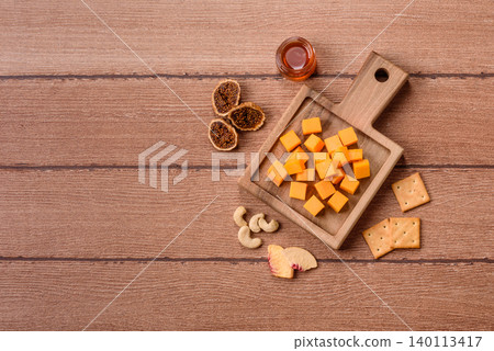 Hard yellow cheddar cheese for sandwiches or pasta. Cheddar cheese Hard yellow cheddar cheese for sandwiches or pasta. Cheddar cheese 140113417