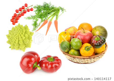 isolated view of a wicker basket filled with fresh fruits and bell peppers alongside romanesco broccoli, carrots, and cherry tomatoes on a solid white background isolated view of a wicker basket filled with fresh fruits and bell peppers alongside romanesco broccoli, carrots, and cherry tomatoes on a solid white background 140114117