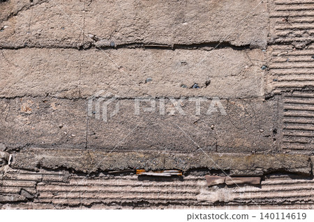 Textured Concrete Wall with Corrugated Sections 140114619
