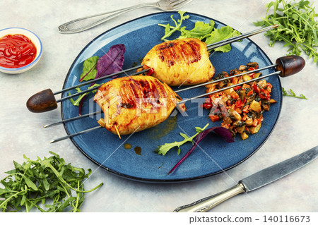 Gourmet grilled stuffed squid on skewers. Gourmet grilled stuffed squid on skewers. 140116673